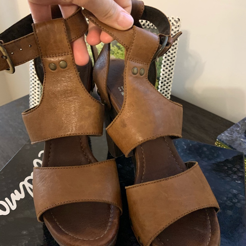 Genuine leather Stuart Weirtzman leather clogs.